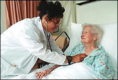 Elderly patient in hospital bed