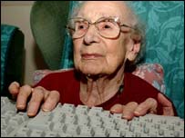 Pensioner using keyboard, PA