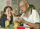 Aviva staff distributed hampers to 13 senior citizens' 
                        homes around Malaysia