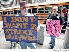 [United Airlines employees picket outside the company's bankruptcy hearing yesterday.]