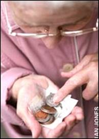 Old lady looking at money