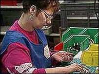 A woman working in a factory