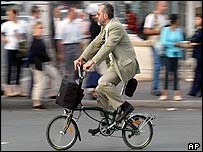 Man cycles to work