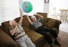 Winifrede Burke, 96, left, and Leone Burton, 87, get their exercise by hitting a beach ball at Pryor Falls Assisted Living Home on Thursday. Data from the Community Care Licensing Division show that there are 178 residential-care facilities in Fresno County with a capacity of 3,362 people.