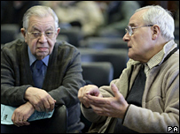 Two men weigh up the issues at the London pension meeting