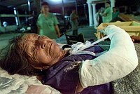 Salvadoran woman Julia Melendez, 82, her 
broken arm in a cast, rests in San 
Vicente, 40 miles from San Salvador 
February 14, 2001. El Salvador was 
struck on February 13 by a powerful new 
6.1 Richter scale earthquake, killing at 
least 170 people an injuring 1,557,  
just one month after a big quake killed 
844 people and left thousands homeless. 
REUTERS/Jorge 
Silva