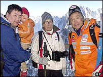 Keizo Miura (centre), taken in 2003 when he was 99