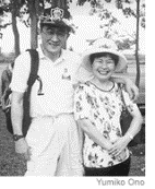 [Photo of Tsunehiko Sato and his wife, Yumiko]