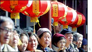 A crowd watches a Lantern Festival performance at a temple in Tianjin, east of Beijing,
