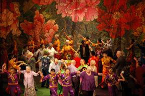 Members from the Chinese Elderly Art Group and the UK Zimmers dance during the one-night show named "East meets West" in London, Britain, March 30, 2008. 